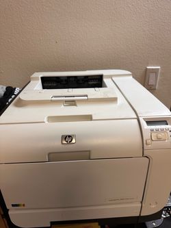 This is an HP LaserJet Pro 400 Color M451dn color laser printer.