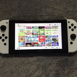 NINTENDO SWITCH MOD with 125 SWITCH GAMES MARIO KART,MARIO PARTY,POKEMON,MINECRAFT,ZELDA and More