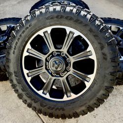 New 2025 20” Ram 2500 Rebel OEM Black Wheels and 285/60R20 Goodyear Duratrac Tires  99% Tread