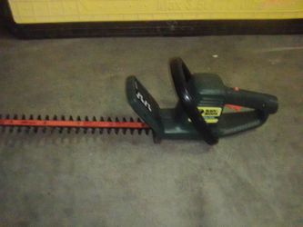 Black & Decker electric tree trimmer with the extras
