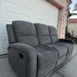 Living Spaces Like New Anton Grey 78" Manual Reclining Fabric Sofa 