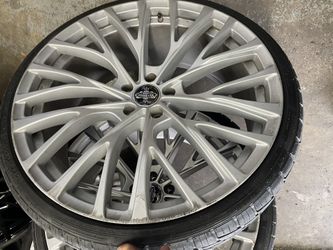 A Set Of 22 Inch Wheels 