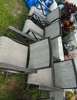 6 Swivel Patio Chairs- Great Condition- NO RIPS