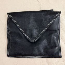 Small black genuine leather belt bag/wallet. Compact, stylish, and practical — perfect for keeping your essentials close while staying hands-free. Uni