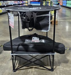 NFL 27.6 ROUND TAILGATE TABLE WITH SHELF