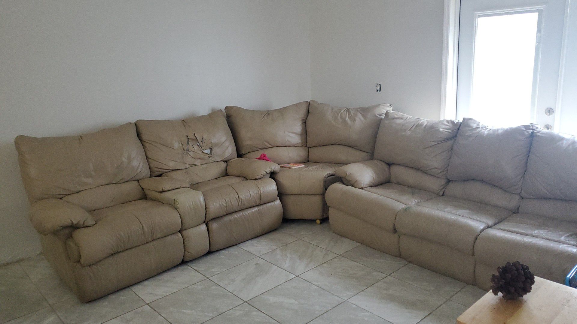 Free sectional with recliner and folding bed