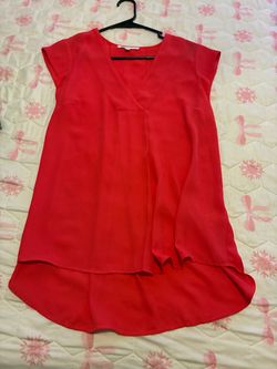 Red Sleeveless V-Neck Blouse