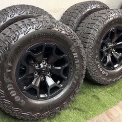 18 inch trx wheels with good year tires 6 lug ram and gm bolt pattern LT325/65r18 tire size same as a 35