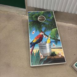 Two solid wood cornhole board with parrots image on top .. 4 x 2 feet $100 for both