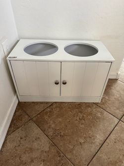 Dog bowl stand with storage
