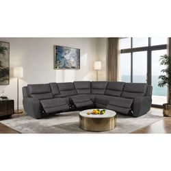 New Spacious Power Reclining Sectional.  Grey/Brown.  134x121x40H; St Ht 19”; DP 22”.  Free Delivery!
