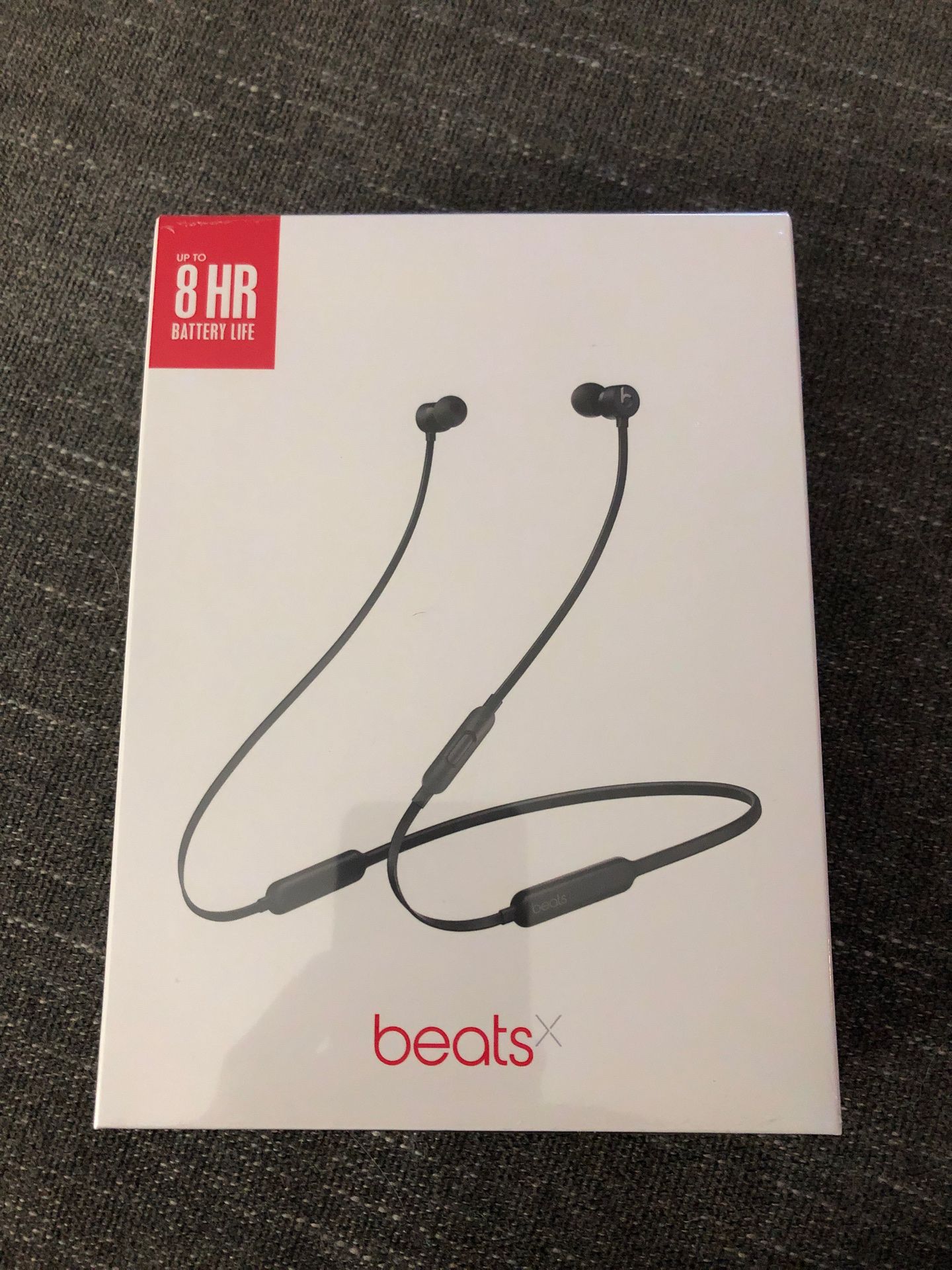 Black BeatsX wireless headphones