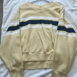 stripped yellow sweater size M
