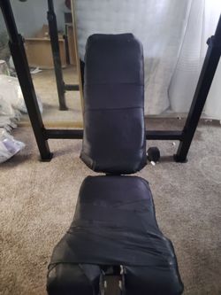 Olympic weight bench. . I put new leather on the cushion