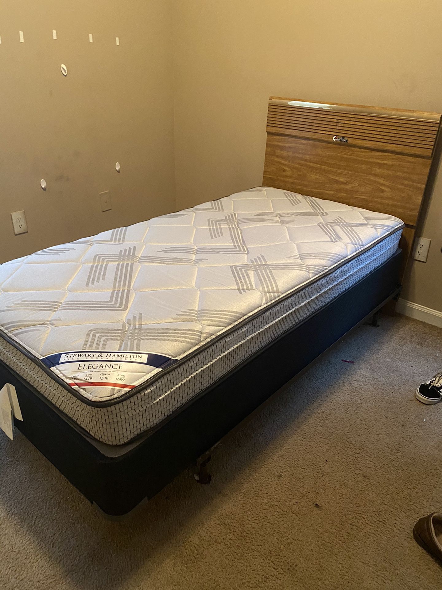 Twin bed for SALE! $350 comes with headboard and mattress and box spring.