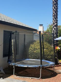 Large Outdoor Trampoline with Safety Net – Barely Used