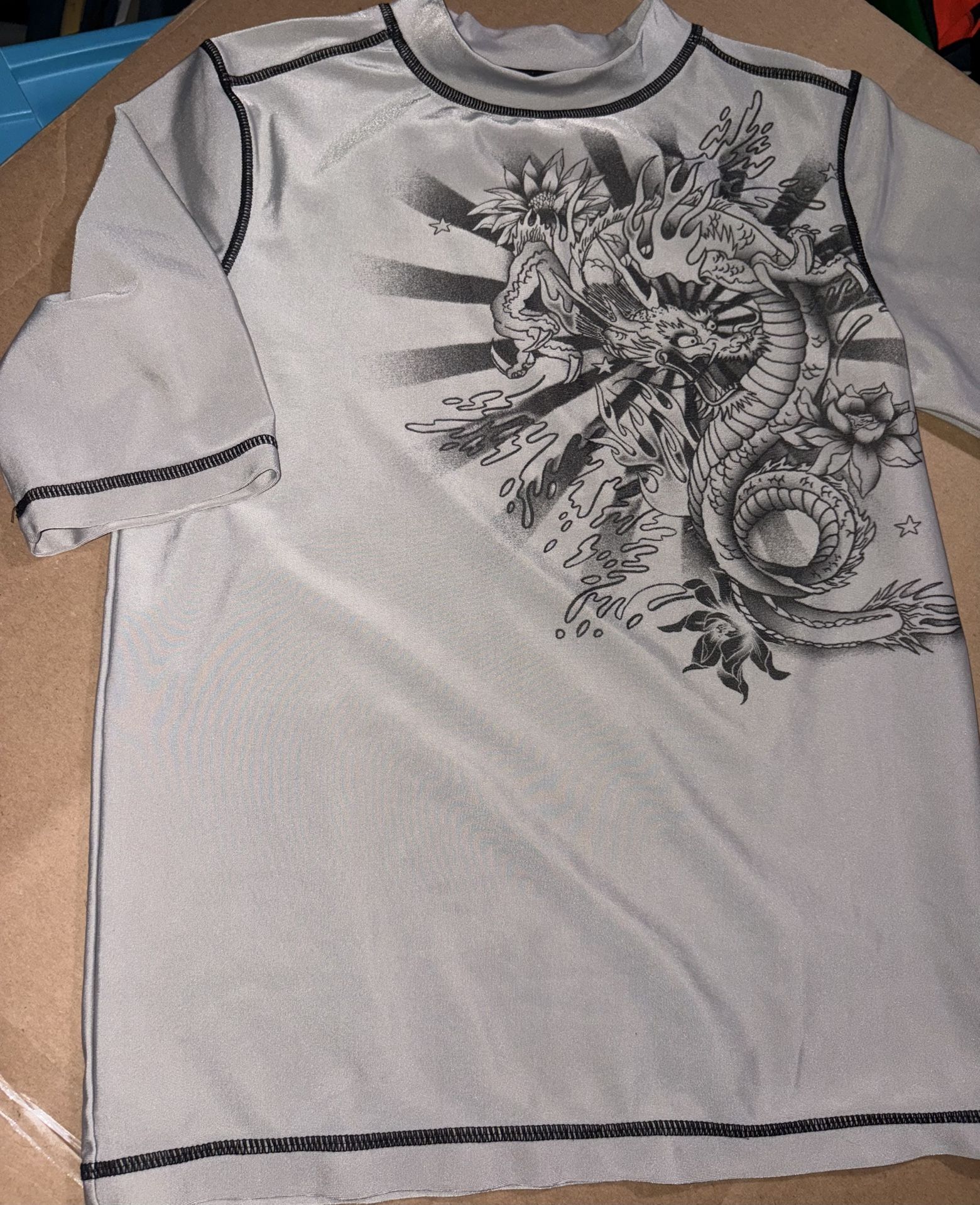 Like New. Boys Large Swim Shirt