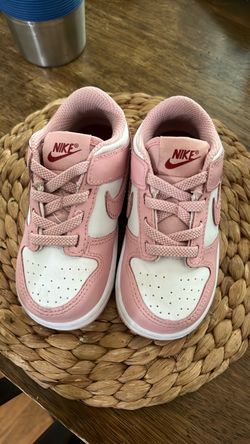 Pink baby Nikes size 4