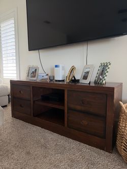 Brown wood TV stand
