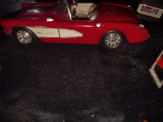 VERY COOL LOOKING VINTAGE RED WITH WHITE PINSTRIPE DESIGNED MUSCLE CAR AM/FM RADIO, IN GREAT CONDITION! WORKS GREAT!!! SOUNDS GREAT!!!