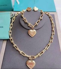 New set 18k stainless steel gold comes with bag