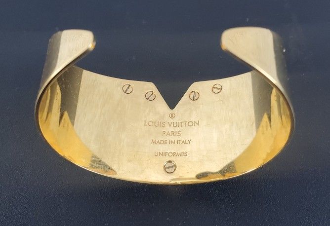 LOUIS VUITTON 'Essential V' Cuff Bracelet in golden brass - VALOIS