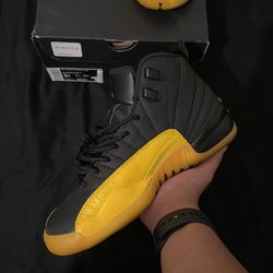 black and yellow jordan 12s
