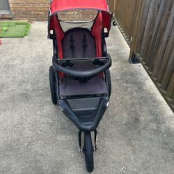 Red And Black Baby Trend  Xcel