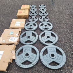 NEW IN BOX Olympic Grip Plates-270lbs 