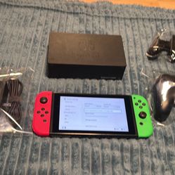Nintendo witch with extra controller, Joycon grip, docking station and memory card no trades cash only 