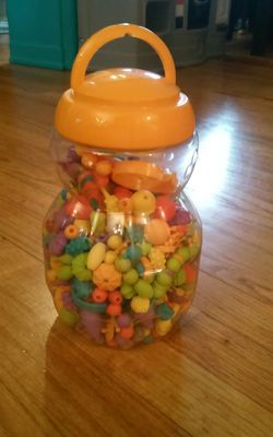 Big jar of beads for toy necklaces etc