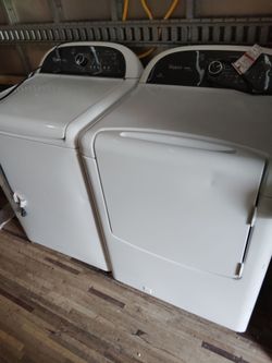 Washer and dryer on pedestal gas