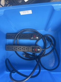 2 white and 2 black 6-outlet power strip