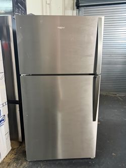 Refrigerator, Whirlpool used 33” wide top freezer with 1 year warranty