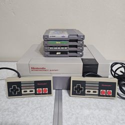 NES Super Nintendo Entertainment System with 4 games 2 controllers