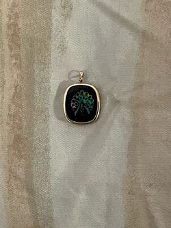 Gold-Tone Black Pendant with Tree Inlay