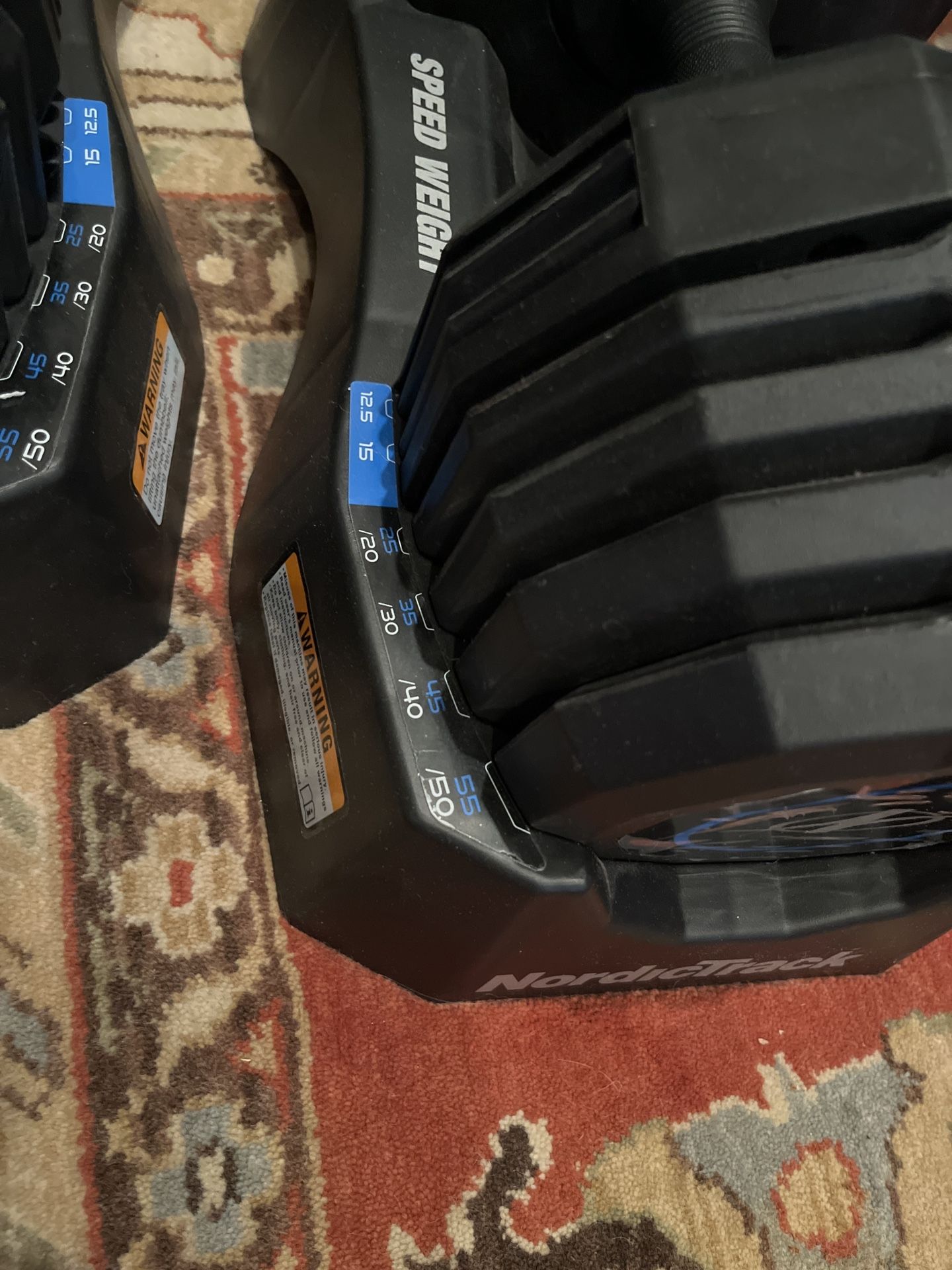 NordicTrack Adjustable Dumbbells – 55 lb Pair with Cradles