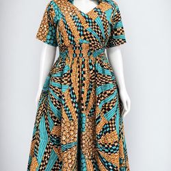 Beautiful African print dress with a stylish hood design. Made with high-quality fabric, comfortable fit, and two side pockets for convenience. Comes 