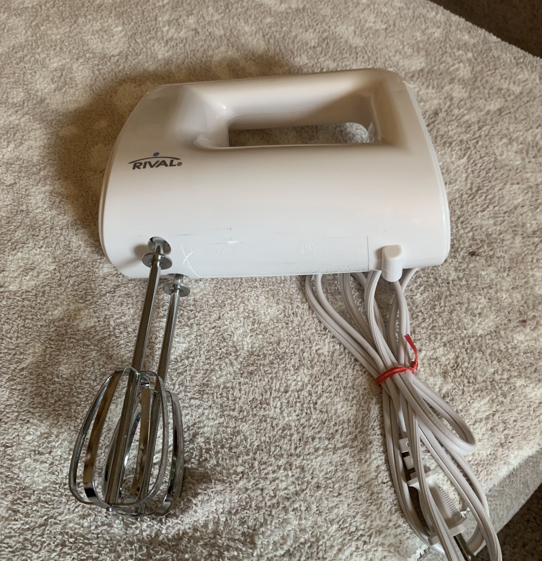 Rival HM-743 5-Speed 150-Watts Hand Mixer Introducing the Rival HM-743 5-Speed 150-Watts Hand Mixer, a versatile and powerful tool for all your blendi