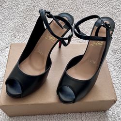 Christian Louboutin black heals. Size 7 1/2 US Never worn, but tried on.