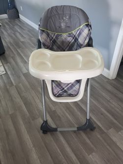 Baby High Chair And Diaper Champ.