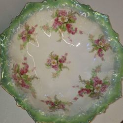 Antique MZ Austria serving bowl Moritz Zdekauer, white with floral and leaf bouquets, green rim with flower burst shape 10.75 inch diameter A58V880
