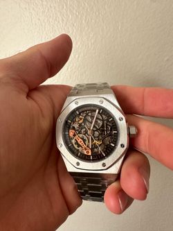Men watch with box