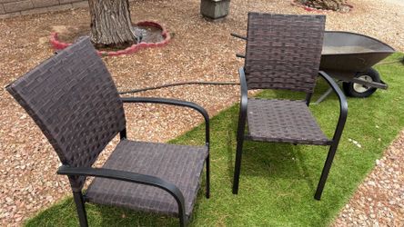 2 whicker brown chairs
