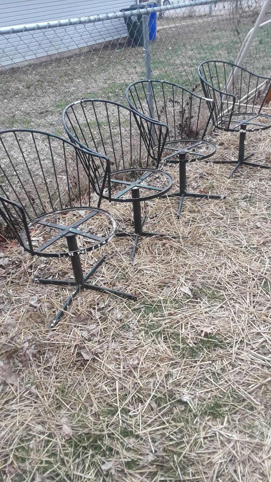 4 of them Rod Iron chairs