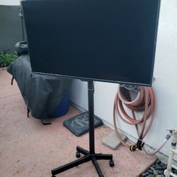 *** Rolling Adjustable TV Stand With TV And Cover ***