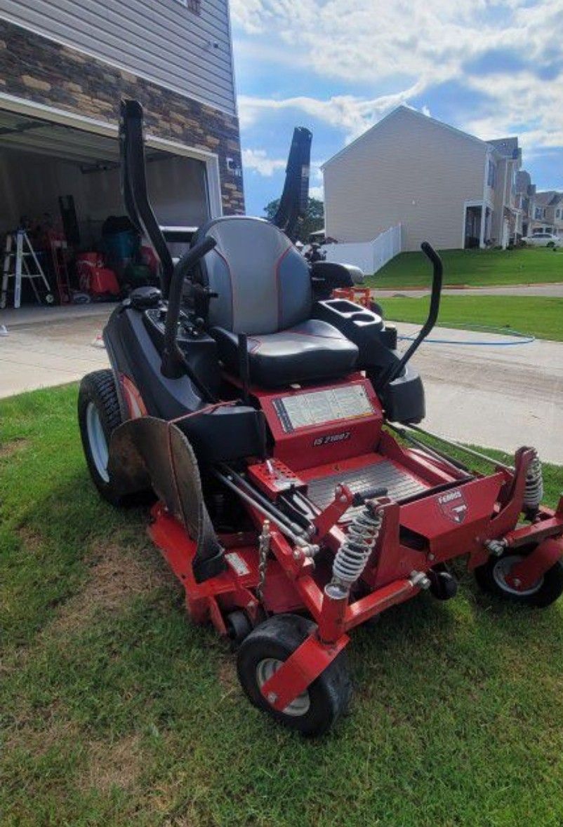 52" ferris mower with 6 1/2 ×10 trailer.