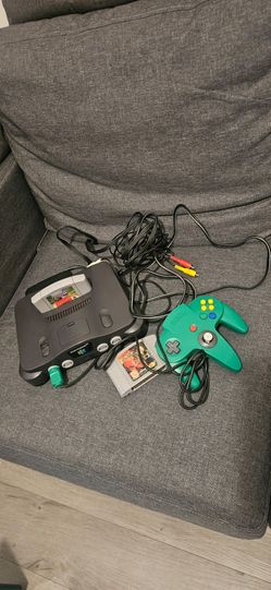 Nintendo 64 with 1 Nintendo controller and 2 games