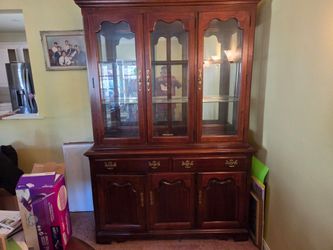 Walnut brown hutch. L 4'8"x H 6'8"x D 1'6"