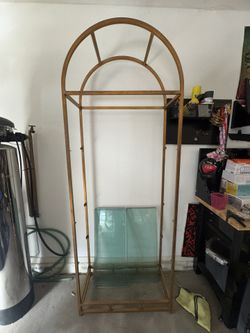Brass Shelving With Glass Panel Shelves